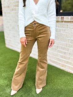 Giving 70s vibes! These flared corduroy pants have two front patch pockets. There is a slight stretch to the fabric which make them a comfortable fit. 97% cotton 3% elastane Model is wearing a size extra small. Flared Corduroy Pants, Super Fly, 70s Vibes, Pants And Leggings, Short Jumpsuit, Skirt Leggings, Corduroy Pants, Denim Pants, Jumpsuit Romper