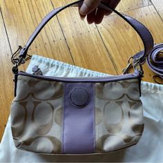 Strap And Dust Bag Included Original Receipt. Purchased In 2012 But Has Never Been Used Very Cute Inner Zipper Pocket No Flaws Authentic Coach Purple Bag With Detachable Strap For On-the-go, Purple Pouch Bag For On-the-go, Coach Rectangular Purple Shoulder Bag, Rectangular Purple Coach Shoulder Bag, Coach Purple Bag With Adjustable Strap, Coach Purple Bag With Detachable Handle, Purple Coach Shoulder Bag With Detachable Handle, Coach Purple Rectangular Shoulder Bag, Coach Purple Shoulder Bag With Adjustable Strap