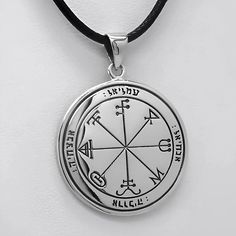 This stunning Third Pentacle of Saturn pendant necklace is made from pure .925 sterling silver and comes with a waxed black cord and your choice of solid sterling silver necklace chains! No coatings, no plating, just sterling silver! Discover our Third Pentacle of Saturn pendant, a stunning planetary talisman crafted from pure .925 sterling silver. This iconic sigil, also known as a King Solomon Seal, is a unique design from the book "The Greater Key of Solomon." Saturn is often associated with structure, order, and wisdom. The Third Pentacle of Saturn is thought to help individuals develop these qualities, overcoming obstacles and achieving their goals. This talisman is also believed to aid in divination and prophecy, granting insights into hidden knowledge. Originally featured in the ren Solomon Sigil, Sigil Necklace, Saturn Pendant, Solomon Seal, King Solomon Seals, Key Of Solomon, Saturn Necklace, Solomons Seal, King Solomon