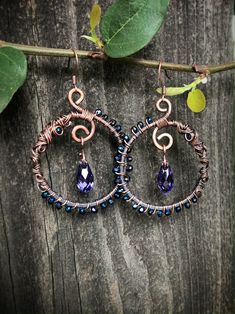 "Introducing the \"Whorls of Whimsy\" Earrings! These amazing copper hoop earrings are the perfect compliment to any outfit! This listing is for 1 set of earrings as pictured, with the bead color of your choice. The dangling teardrop beads used in the earrings are genuine Swarovski briolettes. Choose your Swarovski bead color and I will choose another bead color for woven beads to compliment it, or you can enter any color preference you have in the \"Add your personalization\" section. Please us Handmade Copper Earrings For Party, Beaded Copper Teardrop Jewelry, Copper Beaded Teardrop Jewelry, Copper Teardrop Beaded Jewelry, Wire Wrapped Teardrop Jewelry For Parties, Teardrop Wire Wrapped Jewelry For Party, Beaded Copper Teardrop Earrings, Handmade Copper Teardrop Hoop Earrings, Copper Beaded Teardrop Earrings