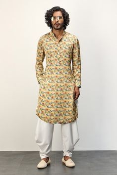 Mustard yellow straight kurta with floral print. Paired with a white dhoti pant. - Aza Fashions Yellow Floral Print Kurta For Diwali, Dhoti With Kurta For Men, Bengali Dhoti Men, Yellow Dhoti Saree, Yellow Dhoti Dress, Yellow Dhoti Kurta For Men, Men Kurta, Dhoti Pants, Straight Kurta