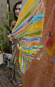 Update! - Zynah covered by LBB - https://lbb.in/bangalore/zynah-designs-handloom-sarees/ Banarasi pure georgette woven saree, decorated with intricate design. Their special characteristics are Mughal inspired designs such as intricate interwining floral and foliate motifs. Other features are gold/Silver work, compact weaving, figures with small details, metallic visual effects, pallus, jal (a net like pattern). Depending on the intricacy of its designs and patterns, a saree can take from 15 days Transitional Yellow Handloom Dupatta, Transitional Handloom Yellow Dupatta, Artisan Multicolor Woven Motifs Dupatta, Multicolor Woven Motifs Saree, Traditional Yellow Embroidered Georgette Fabric, Readymade Blouse, Beautiful Drapes, Silver Work, Small Detail