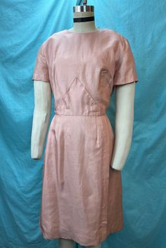 "1950s/1960s W:31 Blush pink silk shantung vintage dress pencil skirt short sleeve  This features a vintage late 50s dress in beautiful blush pink color made out of silk shantung base. Dress have short sleeves, scoop neckline, fitted waist with pointed midriff yoke, pencil skirt, back zipper closure!  MEASUREMENTS  Bust: 40\" Waist: 31\" Hips: 42\" Skirt: 19\" Length: 40,5\" This dress is in very good vintage condition  ✨" Fitted Vintage Dress With Short Sleeves, 1950s Style Fitted Vintage Dress With Short Sleeves, 1950s Style Vintage Dress With Short Sleeves, 1950s Style Short Sleeve Vintage Dress For Formal Occasions, Fitted Short-sleeved Vintage Dress For Daywear, Fitted Vintage Dress With Short Sleeves For Work, Fitted Vintage Dress With Short Sleeves For Daywear, Fitted Vintage Short Sleeve Dress For Work, Fitted Short Sleeve Vintage Dress For Daywear