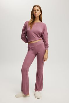 SUPER SOFT RELAXED FLARE PANT Relaxed Fit Wide Leg Leggings For Loungewear, Wide Leg Relaxed Fit Leggings For Loungewear, Purple Relaxed Fit Bottoms, Purple Relaxed Fit Full Length Bottoms, Purple Full Length Relaxed Fit Bottoms, Pink Athleisure Pants For Lounging, Relaxed Fit Mid-rise Loungewear Bottoms, Mid-rise Lounge Pants With Ribbed Waistband, Pink Full-length Bottoms For Lounging