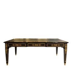 a black and gold coffee table with two drawers