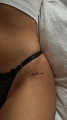 a close up of a person's stomach with the word love written on it