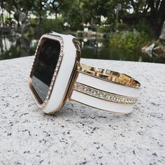 Product Description: ✨ GlamorLink Crystal Metal Apple Watch Band ✨ Elevate your Apple Watch with our GlamorLink Crystal Metal Band, designed to add a touch of elegance and sparkle to your wrist. This premium stainless steel band is adorned with shimmering crystals, making it the perfect accessory for any occasion--whether it's a night out or a casual day at work. 💎 Features: *Sparkling Crystals: Beautifully embedded crystals that catch the light from every angle. *High-Quality Material: Made fr Luxury White Adjustable Watch Bands, Luxury Adjustable White Watch Bands, Luxury White Apple Watch Band With Bracelet Strap, Luxury White Adjustable Apple Watch Band, Luxury Adjustable White Apple Watch Band, White Rectangular Watch Accessories For Gifts, Rectangular White Watch Accessories For Gift, Rectangular White Watch Accessories As Gift, Luxury White Rectangular Watch Bands