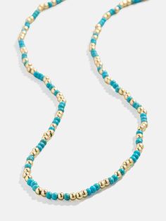 Add subtle pops of color to your look with the Sadie Necklace. Fun and dainty, it’s filled with gold and semi-precious beads. This necklace is an easy hack to brighten up any look, and a starter for those trying to integrate more color into their wardrobe. Wear one of these alone or stack two for that cool layered look. Adjustable Turquoise Necklaces With Gold Beads, Adjustable Turquoise Necklace With Gold Beads, Adjustable Gold Turquoise Necklace With Colorful Beads, Gold Turquoise Necklace With Colorful Beads As Gift, Trendy Turquoise Beaded Necklaces With Round Beads, Trendy Blue Jewelry With Tiny Beads, Trendy Turquoise Round Beaded Necklace, Trendy Blue Beaded Necklace With Tiny Beads, Trendy Turquoise Beaded Chain Jewelry