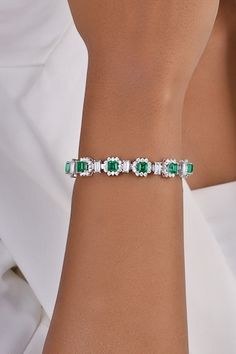 925 sterling silver bracelet with white swarovski zirconia and green manmade emeralds. - Aza Fashions Luxury Silver Tennis Bracelet With Emeralds, Elegant Silver Emerald Tennis Bracelet, Elegant Silver Tennis Bracelet With Emeralds, Luxury Green Cubic Zirconia Bracelets, Elegant Green Crystal Bracelets, Elegant Green Bracelet With Diamond Accents, Elegant Green Bracelets With Diamond Accents, Elegant Green Diamond Tennis Bracelet, Paris Jewelry