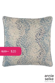 a blue and white pillow with lace on the front, $ 20 99 at annie selke