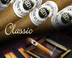 cigars with labels on them sitting in front of an advertisement for the new product