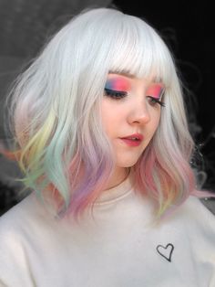 Rainbow Road is a little bit of magic! Starting with very light silvery, ashy roots and fringe, it explodes into a beautiful, soft, multi-coloured ombre. Styled in a cute wavy bob, it's really easy to wear and the perfect wig for a special occasion or photoshoot. The hair for this style is hand dyed in our studio, so every one will be very slightly different - you get your own unique rainbow! Please note: as this wig is made in small batches and hand finished, curl pattern may differ slightly fr Rainbow Melt Hair, Hair Goal, Rainbow Wig, Rainbow Road, Creative Hair Color, Rainbow Ombre, Red To Blonde, Blonde With Pink, Hair Extentions