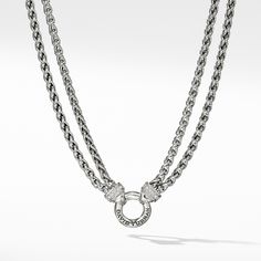 David Yurman chains are inspired by classical and original motifs, and meticulously crafted by artisans. They are designed to be worn alone, layered, or complemented with unique enhancers or charms from our other collections. Sterling silver Pave diamonds, 0.22 total carat weight Circle, 18mm diameter Two wheat chains, 4mm wide each Push-button clasp Style Number: N06876DSSADI Necklace With Diamonds, Double Chain Necklace, Toggle Necklace, Circle Pendant, High Jewelry, David Yurman, Chain Pendants, Diamond Gemstone, Necklace Designs