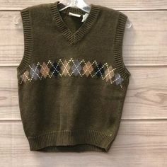 Little Goodies Boys Sweater Size: 06 Fitted Argyle Sweater Vest For Winter, Classic Green Vest For Winter, Classic Green Winter Vest, Fall Argyle Pattern Sleeveless Sweater Vest, Casual Argyle Pattern Vest For Fall, Argyle Pattern Sleeveless Vest For Winter, Casual Sleeveless Argyle Sweater Vest, Green Casual Vest For Fall, Casual Green Vest For Fall