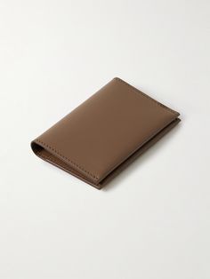 Acne Studios' no-frills wallet will serve you well for years to come. Made from pliable leather in a bifold design, it's fitted with four card slots and subtly gleams with silver lettering. Classic Brown Trifold Card Holder, Classic Brown Trifold Wallet With Interior Card Slots, Everyday Trifold Card Holder With Smooth Grain, Everyday Trifold Smooth Grain Card Holder, Classic Trifold Card Holder With Smooth Grain, Brown Bifold Card Holder For Formal Use, Classic Trifold Card Holder With Leather Lining, Formal Brown Bifold Card Holder, Formal Brown Trifold Wallet