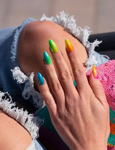 Almond Shaped Nails: Hot and Cold Nails. A rainbow look that fades from blue to green to yellow to orange to pink. Click through for 30 almond nail ideas. #almondnails #shortalmondnails #manicureideas #nailideas IG: @indigonails Classy Almond Nails, Gradation Nails, Nail Bracelet