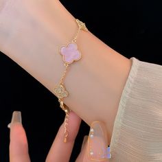 ✦Elevate your style with our 14K Gold Plated Pink Clover Lucky Bracelet, a symbol of good fortune and elegance. Crafted from high-quality copper and adorned with sparkling cubic zirconia, this bracelet features a delicate pink and white clover charm made from Mother of Pearl, promising to bring luck and sophistication to any ensemble. Perfect for those who cherish unique, meaningful jewelry, it's an exquisite addition to your collection or a thoughtful gift for someone special. ----------- DETAI Beautiful Bracelet Unique, Minimalist Accessories Jewellery, Mismatched Earrings Studs, Bracelet Clover, Dainty Designs, Luxe Aesthetic, Pink Clover, White Clover, Clover Bracelet