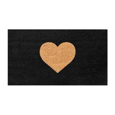 a heart shaped cork board on a black background with the word love written in it