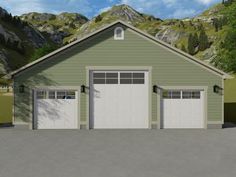 two garages in front of a mountain range