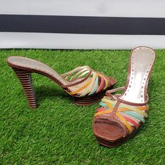 Condition: Used In Great Condition Damage: Normal Wear And Tear On Bottom Of Platform **Not Visible When Wearing** (See Picture) Detials: - 4.75" Heel - Cognac, Yellow, Turquoise, Red, Green - Ribbed Heel And Platform - Strappy Multicolor 4-inch Leather Heels, Multicolor Slip-on Heels For Spring, Multicolor Sandals With Wooden Heel For Spring, Multicolor Platform Slip-on Heels, Multicolor Leather Slip-on Heels, Multicolor Wooden Heel Spring Heels, Multicolor Heels With Wooden Heel For Spring, Multicolor Leather Heels For Spring, Spring Multicolor Heels With Wooden Heel