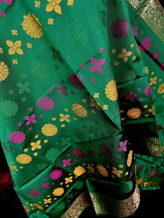 PLEASE NOTE - Width of dupatta is 32 inches and length is 92 inches. Gorgeous Green Color Banarasi Dupatta in Soft Silk Meenakari Chakras and black color tassles on the ends of the dupatta. Makes a Perfect Gift! Item: DupattaColor : GreenFabric : Banarasi Silk (Non-Pure Silk)Work : Meenakari Work with tassels Length of the dupatta : 32 inches (approx)Width of the dupatta : 92 inches (approx) Store Policies- No return or exchange will be accepted for color variations.- No return or exchange will Traditional Green Dupatta With Zari Work, Green Dupatta With Pallu For Navratri, Green Shawl With Traditional Patterns And Drape, Pista Green Jamawar Dupatta For Festive Occasions, Green Bollywood Style Dupatta, Green Art Silk Dupatta For Festivals, Green Art Silk Dupatta For Eid, Green Pallu Dupatta For Festivals, Semi-stitched Pista Green Traditional Wear With Motifs