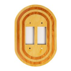 two light switch plates are shown in the shape of an oval, and one is made out of wood