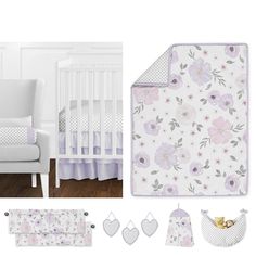 a baby's nursery room with white furniture and pink flowers on the bedding