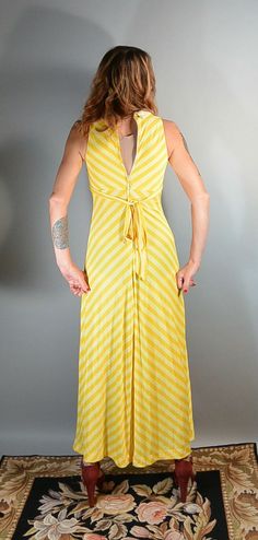 Great little summer dress, long 70s maxi dress bright yellow with stripes and butterfly collar. Super soft cotton dress, fits like a small or XS, I am a size 4 and I had a hard time zipping it up in back. All measurements taken while garment is laying flat. Excellent condition armpit to armpit 15 inches (30 around) empire waist 25 or 26 inches around does have some stretch nape to hem 54 inches Summer Dress Long, Yellow Long Dress, Soft Cotton Dress, 70s Blouse, Dress Butterfly, Kimono Sleeve Top, 80s Prom Dress, Brady Bunch, 70s Maxi Dress