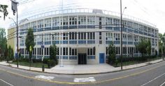 an office building on the corner of a street