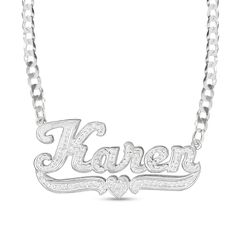 Create a unique fashion statement with the personalized design of this diamond hammered underlined name plate necklace in silver. Crafted in sterling silver This choice features your name - from three to 10 characters in length - sculpted in a bold artful font. Scrolling ribbons and a heart detail underline your name. Diamonds and the hammered texture add shimmer and shine. This 1/15 ct. t.w. diamond look suspends centered along a curb chain that secures with a lobster claw clasp. 18.0-inch tota Silver Engraved Nameplate Necklaces, Custom Engraved Silver Nameplate Necklace, White Gold Nameplate Necklace, Silver Nameplate Custom Necklace, Silver Customizable Nameplate Necklace, Engraved White Gold Nameplate Necklace, Silver Custom Nameplate Necklace, Engraved White Gold Custom Nameplate Necklace, Custom Silver Nameplate Necklace