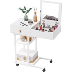 a white makeup vanity with drawers on wheels and various items in the trays below it