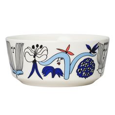 a white bowl with blue and red designs on the side, in front of a white background