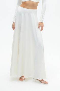 The long skirt is back in a big way, and this asymmetric option is a winning way to wear the trend. Dry clean Material: 60% Viscose, 31% Nylon, 9% Elastane High rise Officially licensed Imported Brand: Nocturne Model Product Size: S Model Size: Height 5'10 / Bust 29.5 in / Waist 23 in / Hips 34 in True the size White Relaxed Full Length Skirt, White Relaxed Full-length Maxi Skirt, Chic Cream Flared Maxi Skirt, White Full-length Lined Skirt, White Maxi Length Lined Bottoms, Cream Asymmetrical Flowy Skirt, Full Length Lined White Skirt, Full Length White Lined Skirt, White Maxi Length Bottoms With Lined Skirt