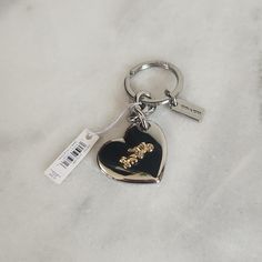 New With Tag! Silver Colored Heart Bag Charm From Coach. Coach Bag Charm, Fancy Diamond Ring, Coach Keychain, Piercing Inspo, Horse Carriage, Luxury Purses, Bag Charms, Heart Bag, Birthday Wishlist