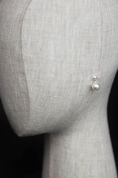 Modern, chic and sophisticated, the Ella pearl earrings will double the decadence with a large pearl drop suspended from a smaller pearl stud. * DETAILS * > Swarovski pearls, silver plated settings > Colours: Silver/ivory > Dimensions: 21mm * READY TO SHIP * The Ella earrings are ready to ship. Please allow 5-7 business days for processing plus delivery times. Please leave your wedding date and phone number for the postal slip in the message box at checkout. * IN A RUSH? * Rush orders a Delicate Pearl White Bridal Earrings With Pearl Pendant, Minimalist Pearl White Pearl Drop Bridal Earrings, Minimalist Pearl White Pearl Earrings For Wedding, Minimalist Pearl White Bridal Earrings With Pearl Drop, Minimalist Pearl Drop Wedding Earrings, Elegant Pearl White Pearl Earrings For Bridesmaid Gift, Minimalist Pearl Pendant Earrings For Wedding, Elegant Pearl White Earrings For Bridesmaids, Minimalist Wedding Pearl Drop Earrings