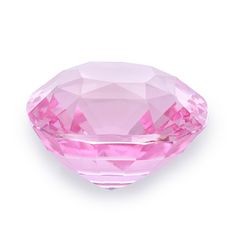 a pink diamond on a white background