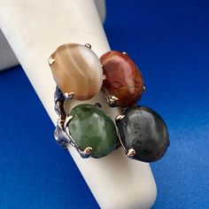 * Retro Custom 14K Yellow Gold Jade Agate Jasper Protection Strength Courage Ring * Ring size: 3.5  * Top of ring measures: 1-1/8" x 3/4" * Height: 5/8" * Ring weight: 7.9 tgw * Stone Measurements: 10.3 mm x 8.6 mm * Unmarked * Professionally assayed. * Condition: Great, as pictured. * Ring can be sized for an additional fee * G1882 * 4% Restocking Fee    Exported By ExportYourStore :) Formal Agate Rings With Natural Stones, Unique Agate Rings With Natural Stones, Unique Agate Gemstone Rings, Elegant Agate Rings For Collectors, Unique Oval Agate Rings, Agate Gemstone Rings In Oval Cabochon, Agate Gemstone Rings In Oval Cabochon Shape, Multicolor Hand-strung Agate Jewelry, Vintage Jasper Jewelry Gift