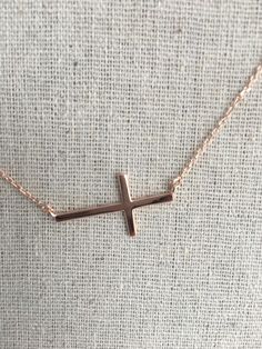 "Silver with rose gold plated side cross adjustable length in 16\" to 18\" necklace" Side Cross Necklace, Minimalist Rose Gold Cross Pendant Jewelry, Minimalist Rose Gold Cross Pendant, Rose Gold Cross Jewelry With Adjustable Chain, Adjustable Minimalist Cross Necklace, Minimalist Rose Gold Cross Pendant Necklace, Minimalist Rose Gold Cross Necklace, Rose Gold Cross Pendant Necklace With Delicate Chain, Minimalist Adjustable Cross Necklace