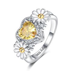 PRICES MAY VARY. 💭【Design Concept】The Handcrafted exquisite daisy rings are a testament to love, and a Sparkling heart-shaped citrine cradled by daisies with hearts merges the blossoming joy with the romantic, representing the warmth of love and enduring affection. ⭐【Material and Size】Our daisy flower promise rings are crafted from premium S925 sterling silver, Ring size 7#, adorned with zircon that catches the sparkling light. 💖【Hypoallergenic and Comfortable】Designed for everyday comfort, ou Yellow Flower Wedding Rings, Flower Shaped Cubic Zirconia Anniversary Ring, Adjustable Flower Shaped Jewelry For Anniversary, Flower-shaped Cubic Zirconia Anniversary Ring, Cubic Zirconia Flower Promise Ring, Adjustable Flower-shaped Jewelry For Anniversary, Silver Flower Ring For Valentine's Day, Silver Round Flower Ring For Valentine's Day, Anniversary Sterling Silver Flower Ring For Mother's Day