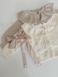 Indulge your little one in the luxury of our delicate Hollow Out Knit Cardigan. The intricate knit pattern and ruffled collar exude sophistication and elegance, perfect for any occasion. With long sleeves for warmth and comfort, this baby cardigan is truly a statement piece in your child's wardrobe. This item requires a 10-12 day processing before being shipped. Morena Outfit, Georgia Style, Baby Olivia, Nursery Rooms, Baby Knitwear, Baby Inspiration, Baby Fits, Baby Necessities, Ruffled Collar