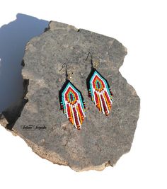 Native American Indian earrings Huichol earrings Black turquoise red Indian beaded Beaded earrings Indian jewelry Colorful earrings Short earrings American earrings Multicolored earring Fringe earrings Navajo earrings 3 inch colorful beaded earrings in American Indian style. These earrings are not authentic Native American earrings, but are made according to my author's design. I was inspired to create these earrings by the bright and colorful culture of the Indians of North and South America. C Southwestern Style Beaded Dangle Earrings, Southwestern Beaded Dangle Earrings, Southwestern Multicolor Earrings With Colorful Beads, Southwestern Multicolor Round Bead Earrings, Southwestern Style Beaded Drop Earrings, Southwestern Beaded Drop Earrings For Pierced Ears, Southwestern Style Colorful Beads Dangle Jewelry, Southwestern Colorful Beaded Dangle Earrings, Southwestern Style Colorful Beaded Dangle Earrings