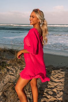 - Style this airy cover-up with your favorite sunnies and trendy swimsuit for a beach-bound look that will have you turning heads! - Lightweight material - A v-cut neckline with a low cut back and a tie detail - Short loose sleeves with ruffled cuffs - A relaxed silhouette that ends in a ruffled hemline Summer V-neck Swimwear For Beach Season, Summer Beach Dress With V-neck For Pool, Breezy V-neck Beach Cover-up, Casual V-neck Swimwear For Beach, Summer V-neck Pool Cover-up, Summer V-neck Beach Cover-up Swimwear, Breezy V-neck Beach Season Cover-up, Breezy V-neck Beach Dress For Summer Outings, Solid Color Beachy Cover-up For Beach Season