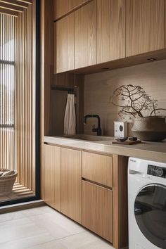 Bonsai and pebble details in serene utility room design Scandinavian Laundry Room, Scandinavian Storage, Laundy Room, Gallery Wall Ideas, Laundry Room/mud Room, Scandinavian Kitchen Design, Laundry Room Closet