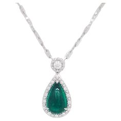 Gorgeous 3.35 ct. emerald cabochon pear shape with 0.25 ct. good quality white diamond rounds. Handmade in 18k white gold. Luxury Pear-shaped Emerald Gemstone Necklace, Pear-shaped Emerald Gemstone Necklace For Formal Events, Pear-shaped Emerald Gemstone Necklace For Formal Occasions, Luxury Teardrop Emerald Necklace With 17 Jewels, Exquisite Pear-shaped Emerald Necklace For Formal Occasions, Formal Pear-shaped Emerald Necklace In Fine Jewelry Style, Formal Pear-shaped Emerald Necklace Fine Jewelry, Formal Pear-shaped Emerald Necklace, Luxury Pear-shaped Diamond Emerald Necklace