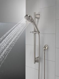 a shower head with water running from it