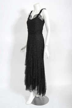 For Sale on 1stDibs - A magnificent Bonwit Teller & Co couture black lace bias-cut gown from the 1930's 'Old Hollywood' era of glamour. The fabric itself is a masterpiece; French Vintage Fitted Lace Evening Dress, Vintage Lace Evening Dress For Formal Occasions, Scalloped Lace, Lace Applique, Sheer Lace, Old Hollywood, Black Lace, Evening Dresses, Hollywood