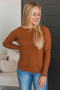 Britta Casual Brown Sweater With Ribbed Neckline, Snug Long Sleeve Tops For Fall, Snug Fit Long Sleeve Tops For Fall, Brown Tops With Ribbed Cuffs For Fall, Brown Ribbed Long Sleeve Knit Top, Brown Top With Ribbed Cuffs For Fall, Cozy Stretch Brown Sweater, Cozy Fitted Knit Top For Fall, Brown Ribbed Crew Neck Sweater