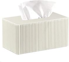 a tissue dispenser sitting on top of a white box