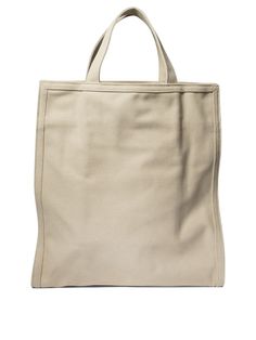 A.P.C.'s "Recuperation" Tote is the perfect balance of style and utility, designed for the modern man who doesn't want to compromise on elegance during his dynamic days. With its military-inspired look, this bag is ideal for accompanying you on your daily adventures, offering ample space and functionality. - Size: 36x40x11 cm - Unbleached cotton canvas in military style - Hand handles for carrying the bag by hand - The shoulder strap adjusts with a metal buckle to carry the bag on the shoulder o Paris Logo, Pre Fall Collection, Military Inspired, Military Style, Classic Sneakers, Cotton Logo, Open Top, Military Fashion, Modern Man