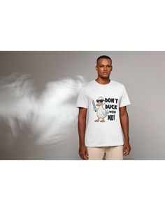 Take a chance and add some edge to your wardrobe with our Men's T-Shirt - Don't Duck With Me. This playful design features a cool duck graphic, complete with a knife and sunglasses. Perfect for those days when you're ready to take on the world (or the pond) with a little attitude. Funny White Relaxed Fit T-shirt, Funny Relaxed Fit White T-shirt, Casual Cotton Sublimation T-shirt With Funny Print, White Cotton Sublimation T-shirt With Funny Print, Short Sleeve Cotton Sublimation T-shirt With Text Print, Casual Cotton Sublimation Design With Funny Print, White Novelty T-shirt With Letter Print, Funny White Cotton T-shirt, Funny White T-shirt With Screen Print